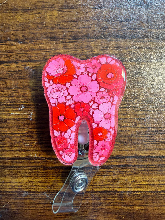 Floral tooth badge reel 479