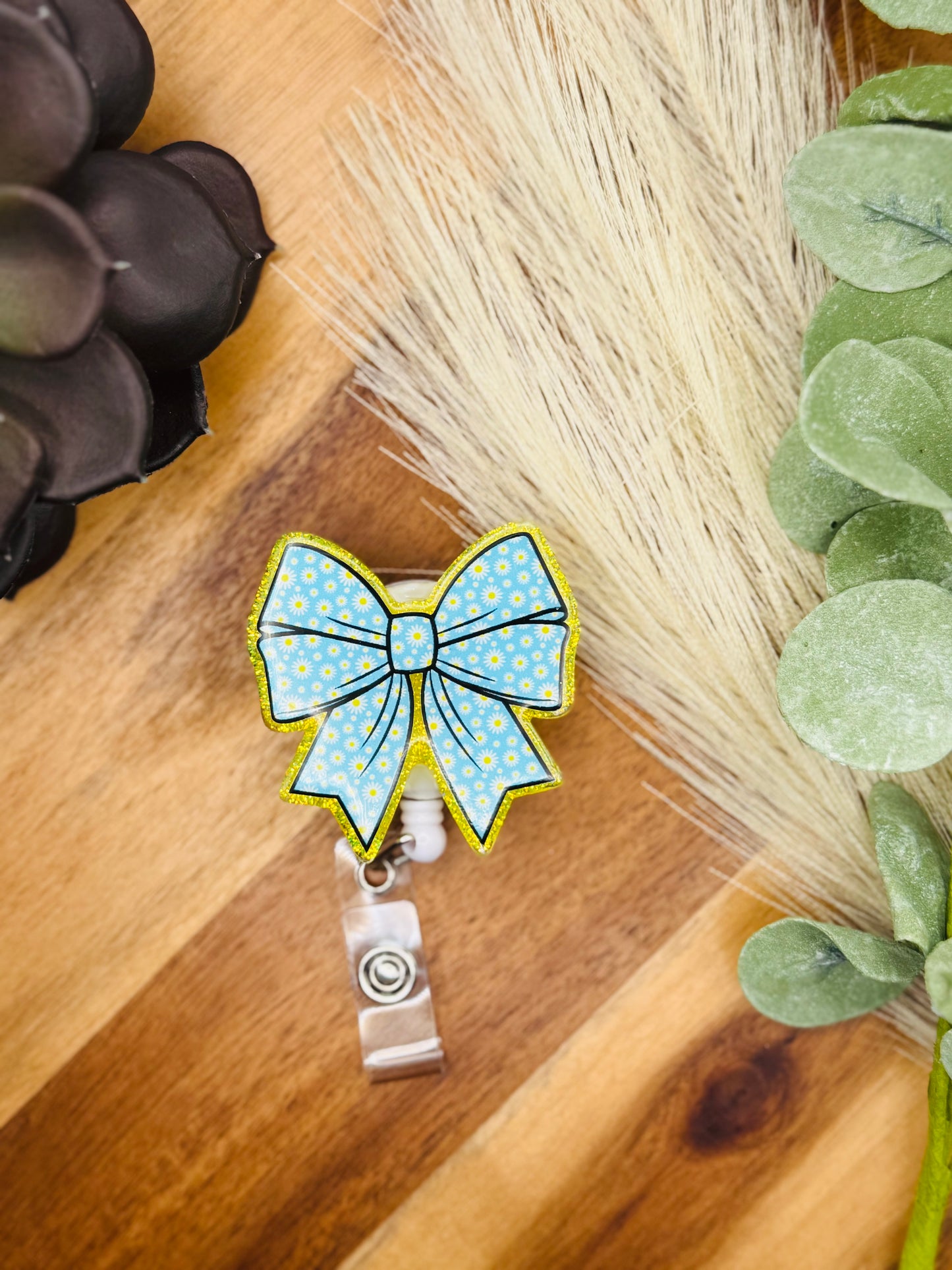 Daisy Bow Badge Reel